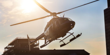 Can pilots legally land a helicopter in a fast-food parking lot?